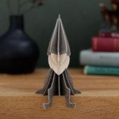 Lovi Elf, grey, on bookshelf