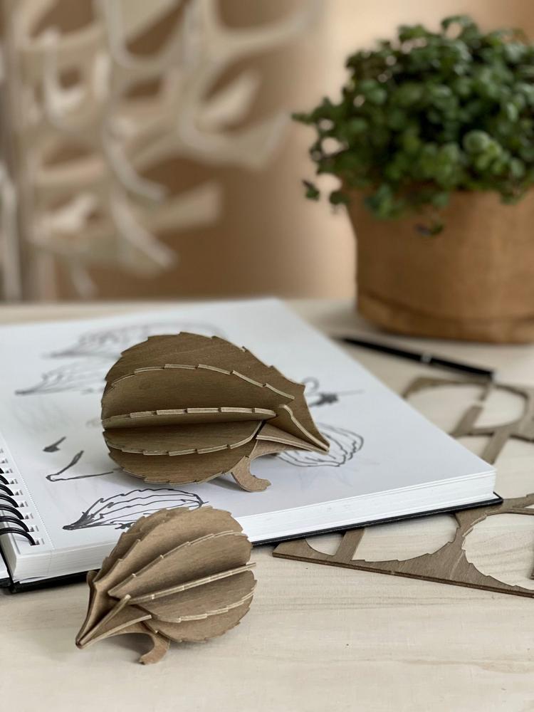 Wooden Lovi Hedgehogs on the sketch book. Finnish design often finds its topics from the nature.