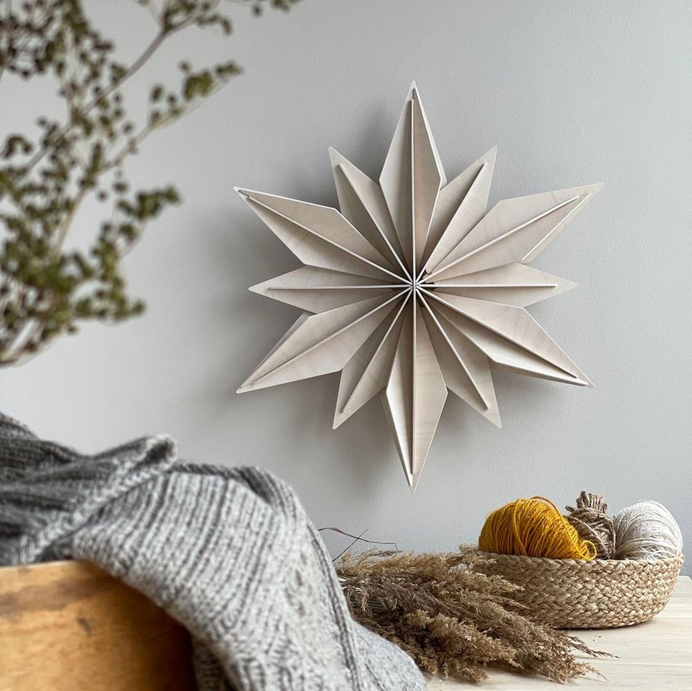 Wooden Lovi Decor Star 48cm mounted on the wall. Color white.