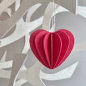 Wooden Lovi Heart hanging on the branch of Lovi Tree