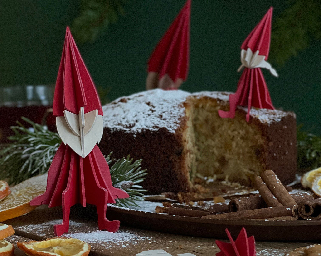 Red Lovi Elves on Christmassy bundt cake.