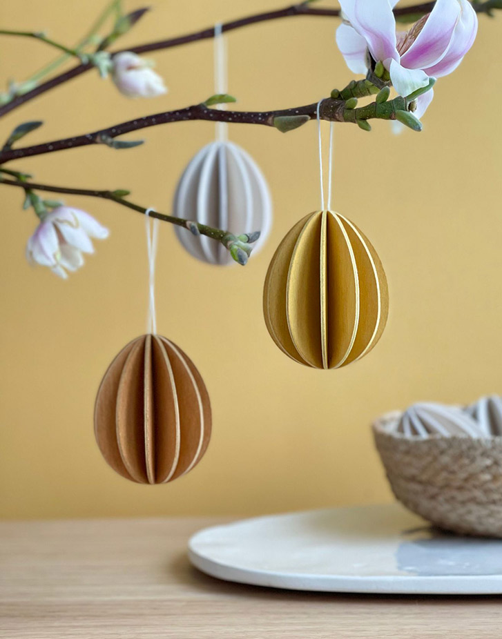 Wooden Lovi Easter Eggs hanging on the branch