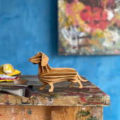Lovi Dachshund, wooden dachshund figure, cinnamon brown, on painty stool