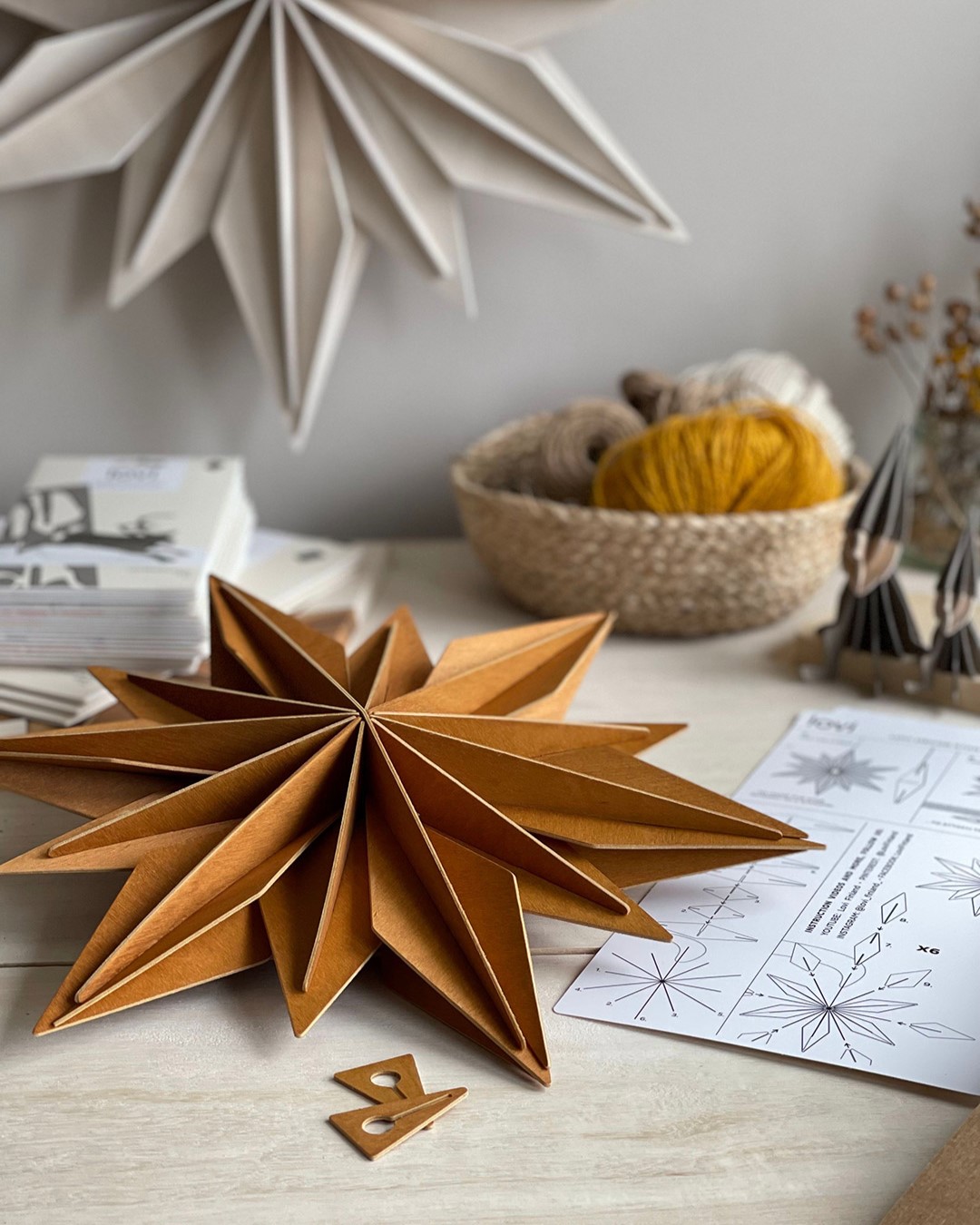 Lovi Decor Star, wooden decorative star, on table and on wall.