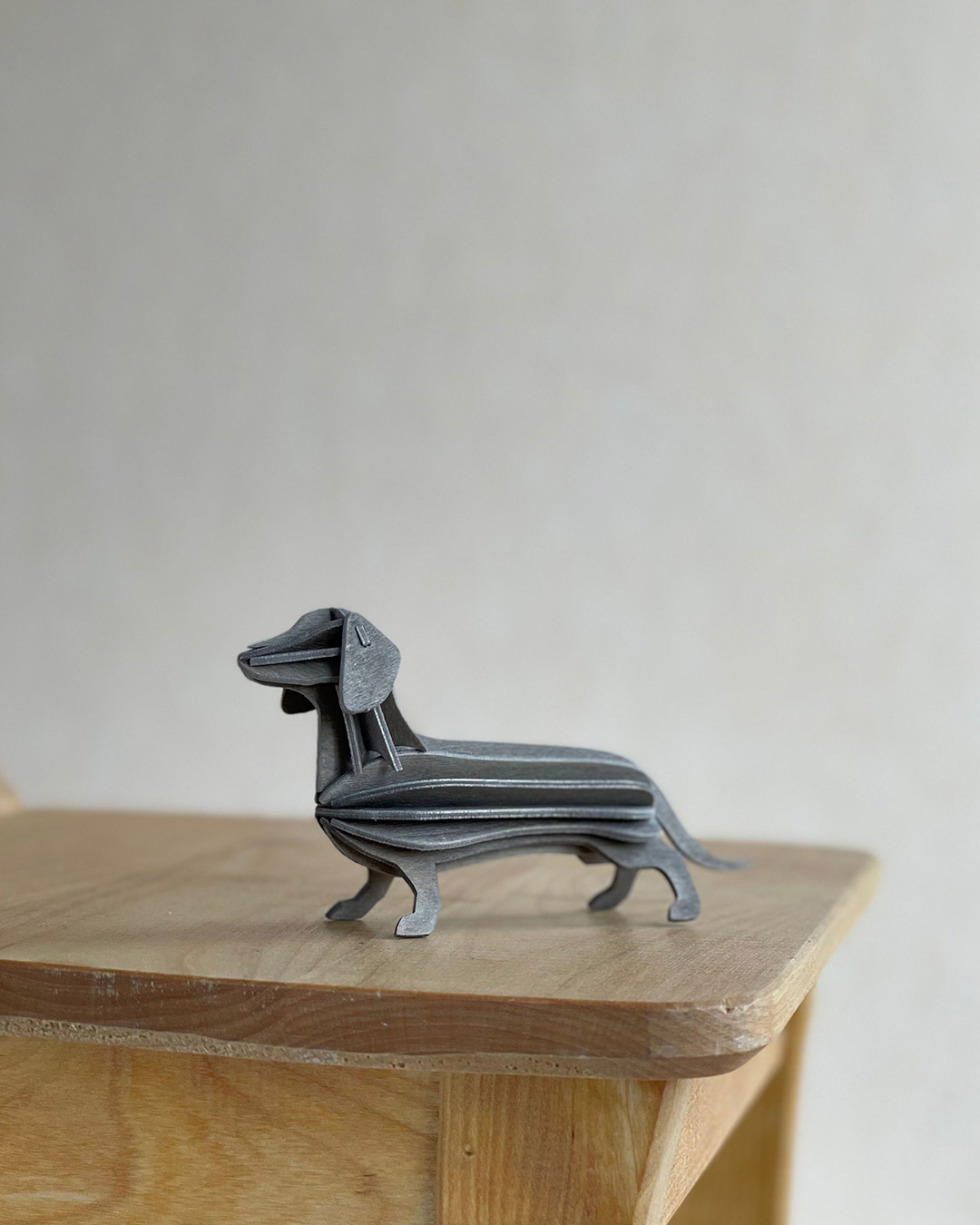 Wooden Lovi Dachshund 12cm, color grey, little dachshund figure, made in Finland
