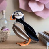 Wooden Lovi Puffin on table, decorative puffin figure, size 20cm, color black.