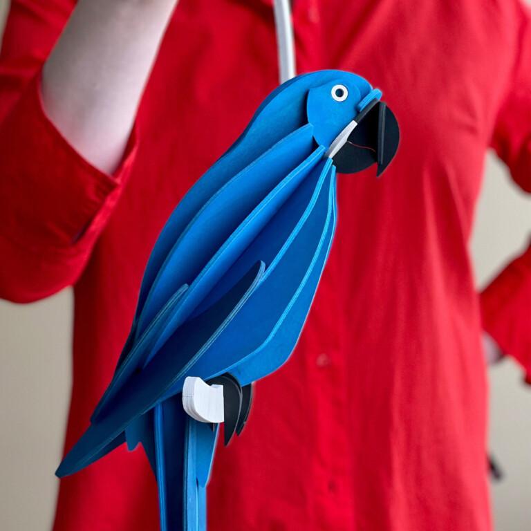 Lovi Parrot 50cm Blue - Hyacinth Macaw, wooden parrot figure, sitting on the wooden hanging crescent