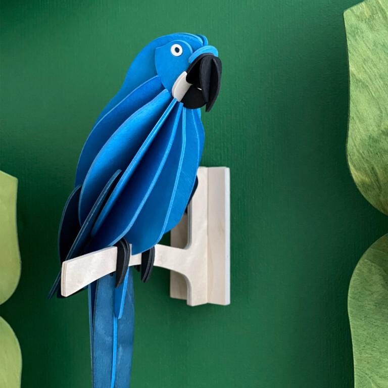 Wooden Lovi Parrot Blue - Hyacinth Macaw, decorative parrot sitting on the branch mounted on the wall.